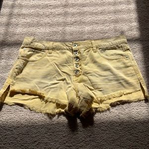 Free people yellow denim shorts. Distressed. Size 29.